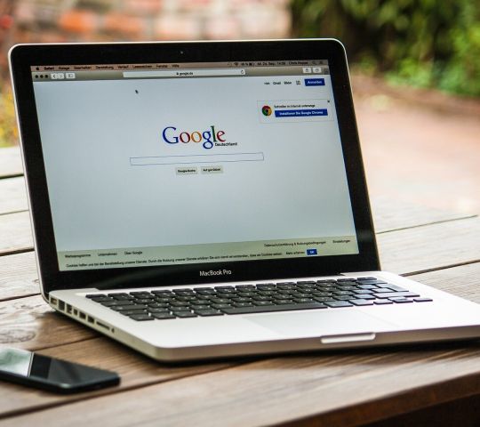 laptop showing Google homepage