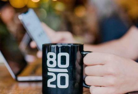 Person holding a mug